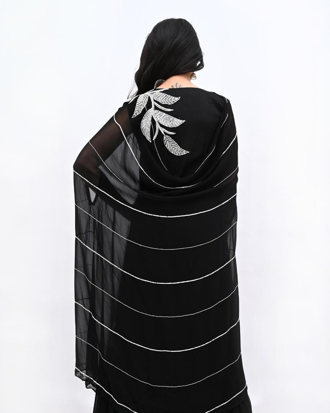 Black flared gown with silver stonework